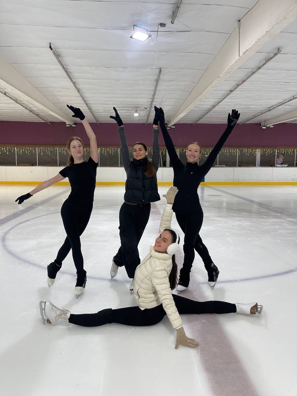 Anastasiia smiling on the ice after a private lesson with Coach Darina